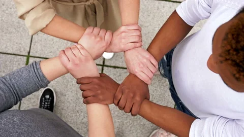 Symbolic plexus of hands with different skin colors. Stock Footage 132354962