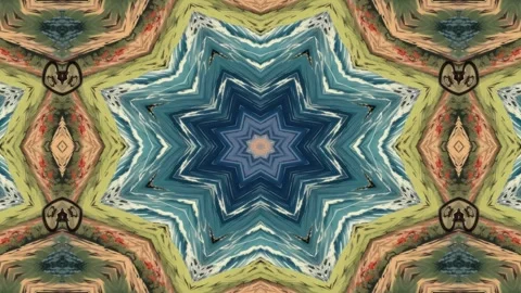 A symmetrical abstract design featuring circular patterns in blue and orang.. 動画素材 292595750