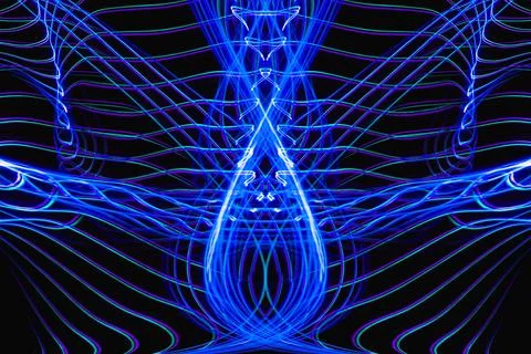 Symmetrical abstract waves with selective focus in blue and green light pat.. Stock Illustration