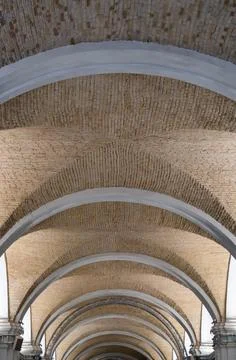 Symmetrical arched brick ceiling architecture Stock Photos