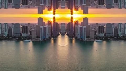 Symmetrical composition of high rise building on waterfront in sunset time Stock Footage 196195454