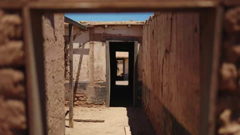 Symmetrical door frame in abandoned Chacabuco prison alley Vídeos de archivo 337874591