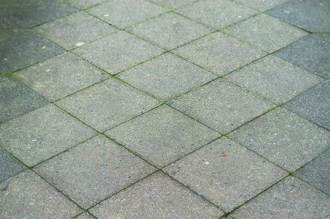 Symmetrical gray square tile pattern creating modern background Foto stock