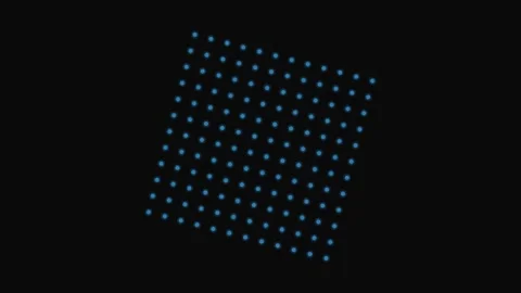 A symmetrical grid of vibrant blue glowing dots against a deep black backgrou Stock Footage 339618296