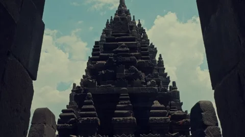 Symmetrical Low Angle View of Ancient Hindu Temple Spire Silhouette Stock Footage 333325809
