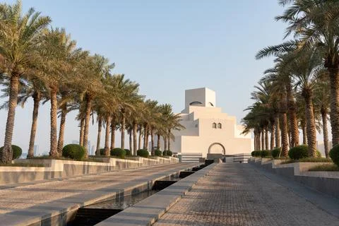 Symmetrical Palm Tree Path Leading to Museum of Islamic Art Doha Qatar. Фото