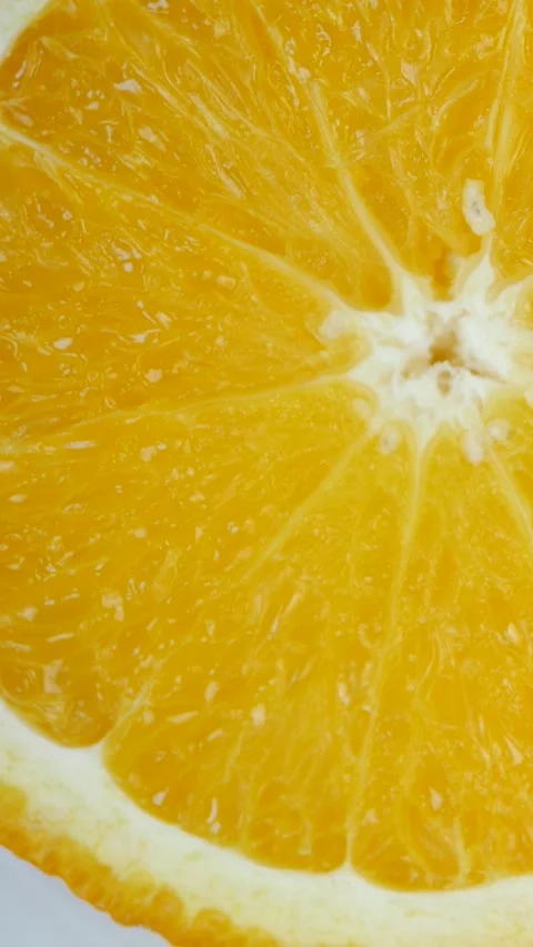 Symmetrical pattern of orange slices shows vibrant geometry Stock Footage 316560262