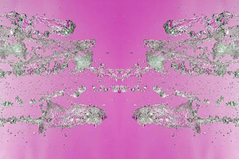 Symmetrical pattern of stopped water droplets with transparent streams on a p Stock Photos