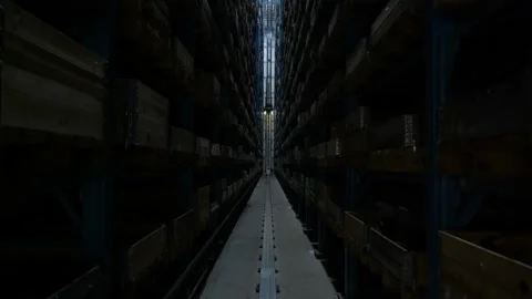 Symmetrical perspective of a narrow aisle in a high tech automated warehouse Stock Footage 328644892