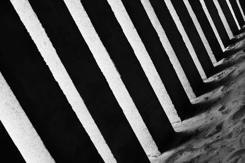 Symmetrical row of columns for maintain architectural structure, abstract a.. Foto stock
