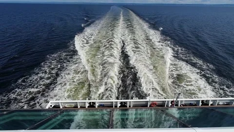 Symmetrical Ship Wakes Reflected on Cruise Vessel Window Stock Footage 339367096