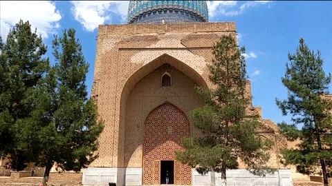 Symmetrical view of Bibi-Khanym mosque with ribbed turquoise dome Stock Footage 336846206