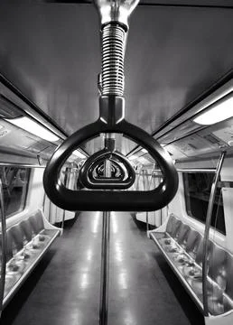 Symmetrical View of Empty Subway Car with Handrails Stock Photos