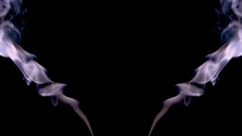 Symmetrically moving colored smoke on a black background. Видео 122987020
