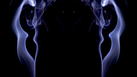Symmetrically moving colored smoke on a black background. Video stock 122987388
