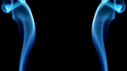 Symmetrically moving colored smoke on a black background. Vídeos de archivo 123769066