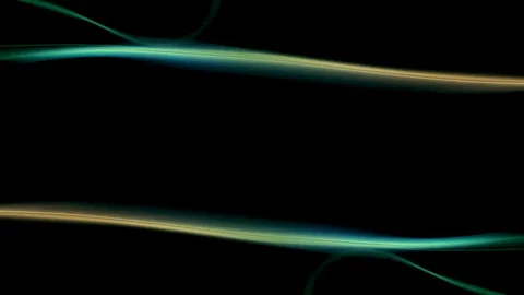 Symmetrically moving colored smoke on a black background. Video stock 123969953