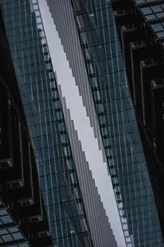 Symmetry and mirrored geometry pattern, reflected skyscrapers and modern 스톡 사진