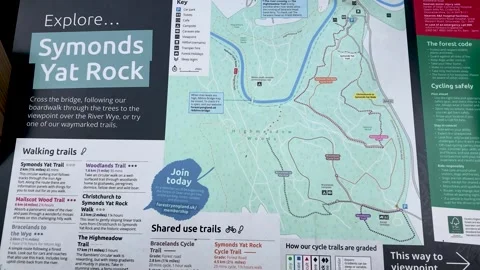 Symonds Yat Rock information board, showing local walking and cycle trails on a Stock Footage 345644639