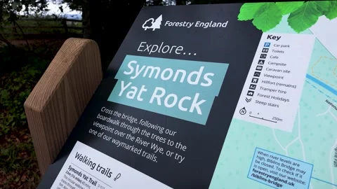 Symonds Yat Rock visitor map board for Forestry England fills the shot, showing Stock Footage 345645051