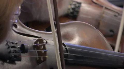 Symphony orchestra the musician's hands play a bow on the violin. Stock Footage 155003203