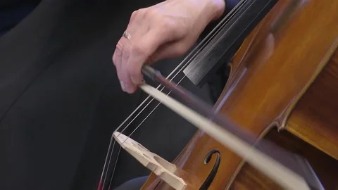 Symphony orchestra the musician's hands play a bow on the violin. Stock Footage 155003334