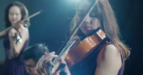 Symphony orchestra performance, close-up of stringed instruments at work Stock Footage