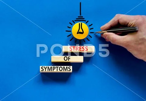 Symptoms of stress symbol. Concept words Symptoms of stress on wooden ...
