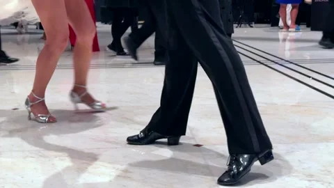 Synchronized movement of two dancers feet representing coordination, rhythm and Video stock 326215341