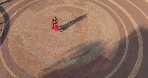Synchronized movements and steps of dancers along the cobbled street of the park Stock-Footage 114917336