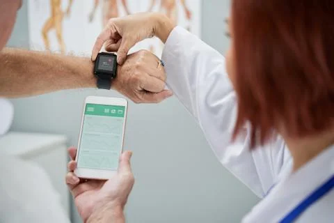 Synchronizing devices Stock Photos