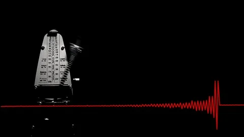 Synchronous swinging metronome Stock Footage 112710212