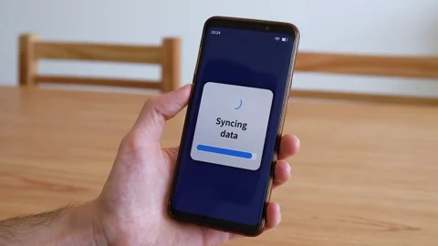 Syncing data of your phone with cloud service. Video stock 321358140
