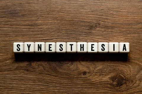 Synesthesia - word concept on building blocks, text Stock Photos