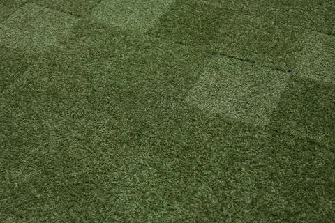 Synthetic turf square patch green texture variation Stock Photos