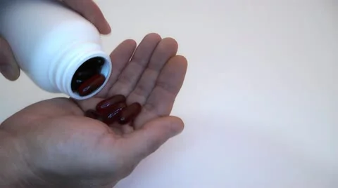 Sypyatsya pills in hand Stock Footage 14824974