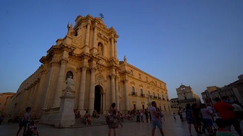 Syracuse Dome. Tourist walking in front of a Cathedral square. Stock Footage 91949598