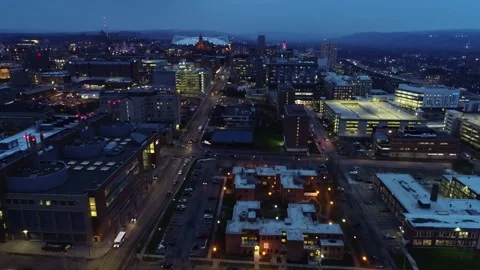 Syracuse New York State Downtown Glowing at Night with City Lights from Above Stock Footage 344876850