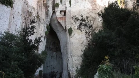 Syracuse sicily italy ear of dionysius close up entrance outside front with pan Stock Footage 252154833