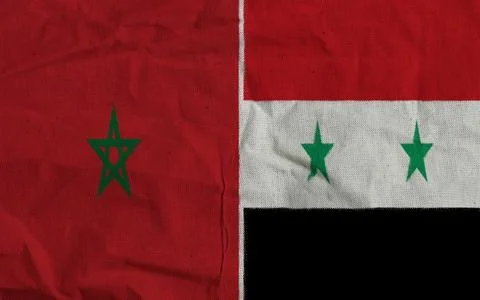Syria and Morocco two flags textile cloth, fabric texture Stock Photos