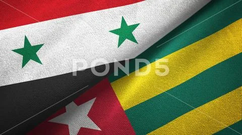 Syria and Togo two flags textile cloth, fabric texture Stock Photos