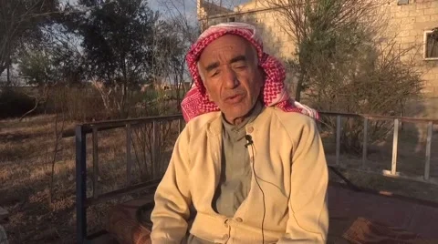 Syria, October 22, 2016: Old man speaking in front of building, ISIS war 動画素材 68794549