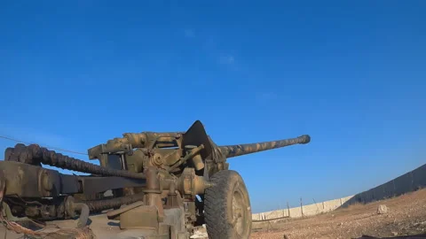 Syria, the outskirts of Aleppo, shooting guns d 30. Stock Footage