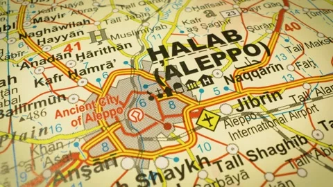 Syria road network leading toward Aleppo – gliding view over an atlas map Stock Footage 345784314