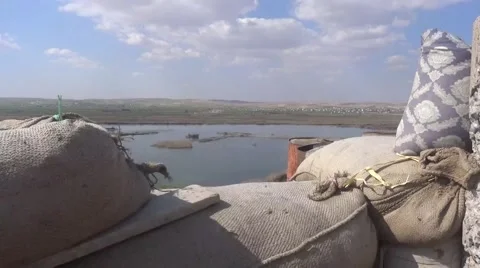 Syria: Scene of army front on Eufrat, Jarabulus town, ISIS war, SDF (YPJ,YPG) Stock Footage 68788462