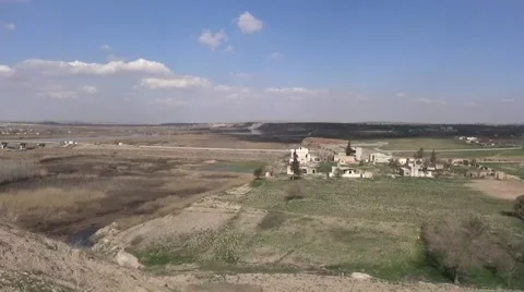Syria: Scene of army front on Eufrat, village background,ISIS war, SDF (YPJ,YPG) 動画素材 68788516