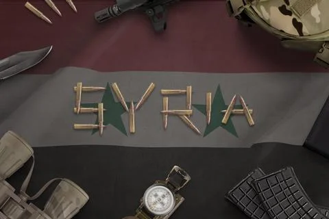 Syria war composition with bullets on flag and military equipment Stock Photos