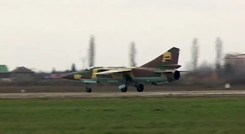 Syrian Air Force. Fighter MiG-23 (NATO: Flogger) moves along taxiway. Stock Footage 142008347
