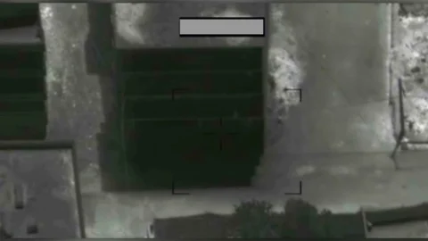 Syrian Forces bomb ISIS compound in Raqqah, Syria Stock Footage 94566920