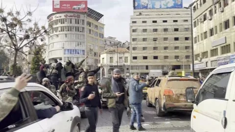 Syrian rebels announce fall of Assad, prisoner release after capturing Damascus, Stock Footage 294973648